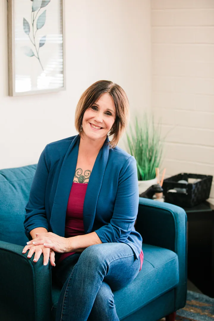 Lori Wilson seated in her counseling office