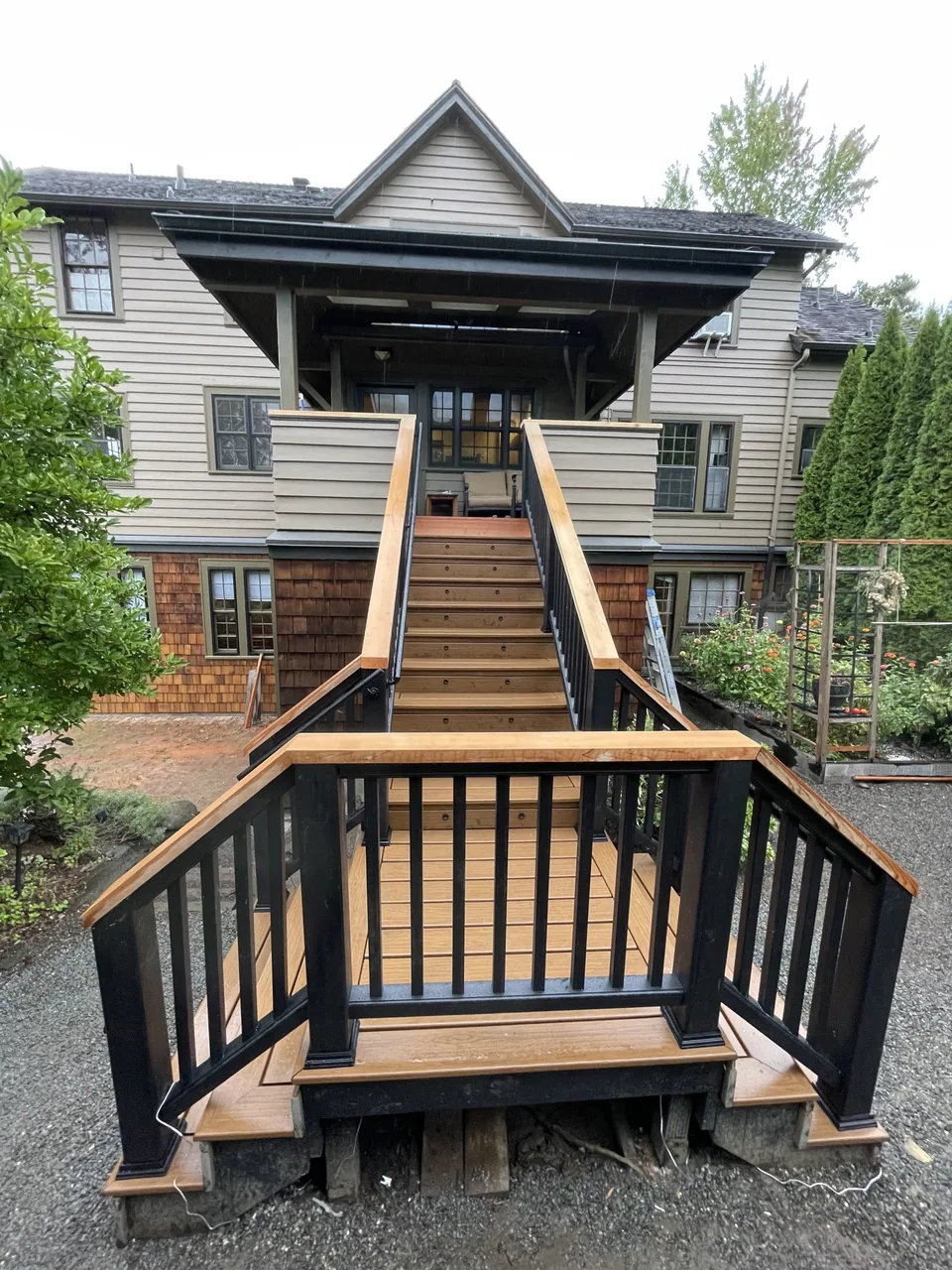 Two-level deck and stairs built by To the T